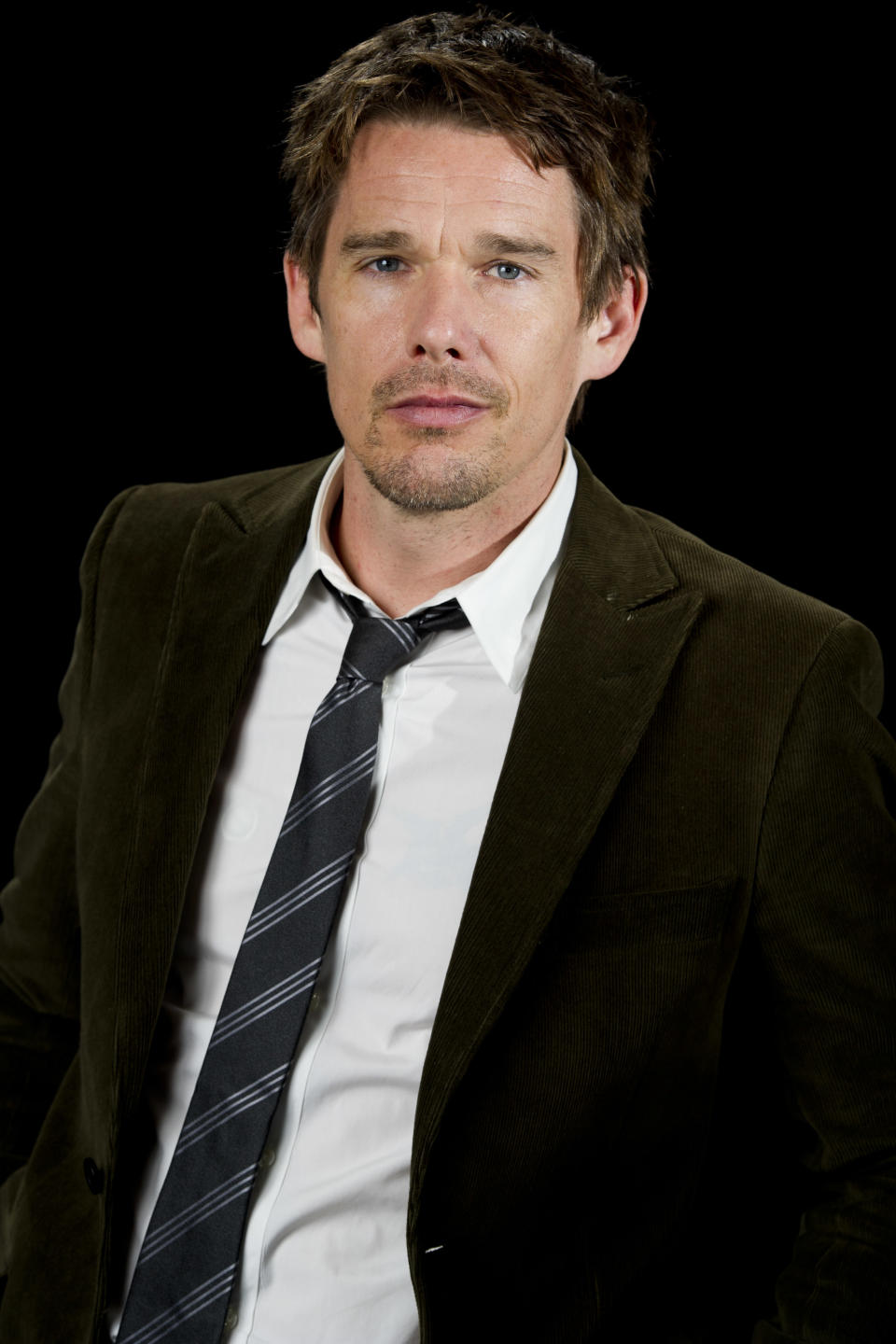 This June 11, 2012 photo shows actor Ethan Hawke in New York. Hawke portrays a frustrated American writer who moves to Paris to be closer to his young daughter in “The Woman in the Fifth." (Photo by Charles Sykes/Invision/AP)