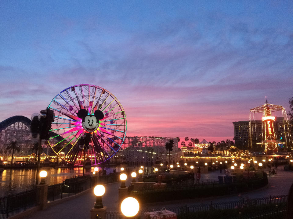 Tourists wander around Disney's California Adventure located adjacent to Disneyland, a major tourist attraction in Anaheim. The infected teen visited the park as well as several other popular attractions in the area, authorities said. (Photo: P_Wei via Getty Images)