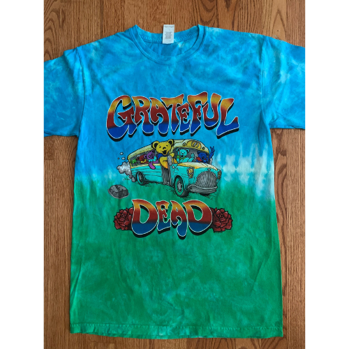 Grateful Dead Dancing Bear Bus Shirt on wooden floor