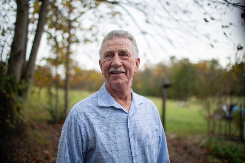 Charlie Norman stands outside of his home in Maury County, Tenn., on Wednesday, Nov. 3, 2021.