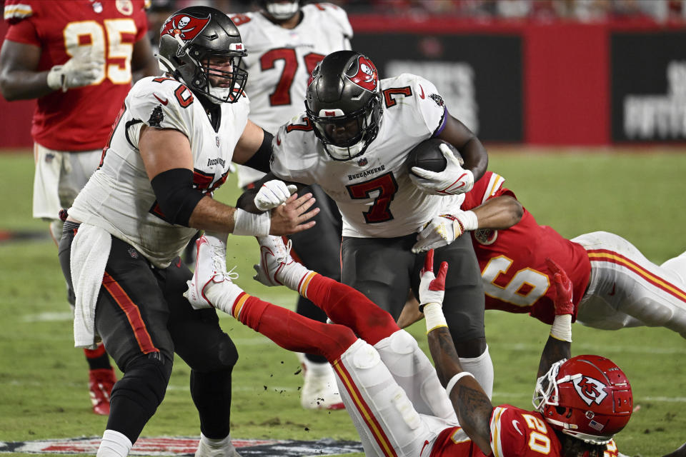 Tampa Bay Buccaneers running back Leonard Fournette (7) carries the ball during the second half of an NFL football game against the Kansas City Chiefs Sunday, Oct. 2, 2022, in Tampa, Fla. (AP Photo/Jason Behnken)