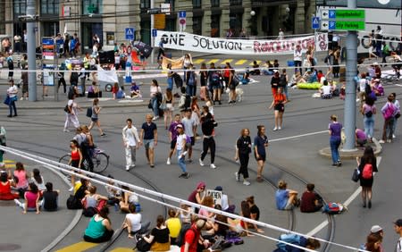 Traffic is blocked by participants of a women's strike at the Central Square in Zurich
