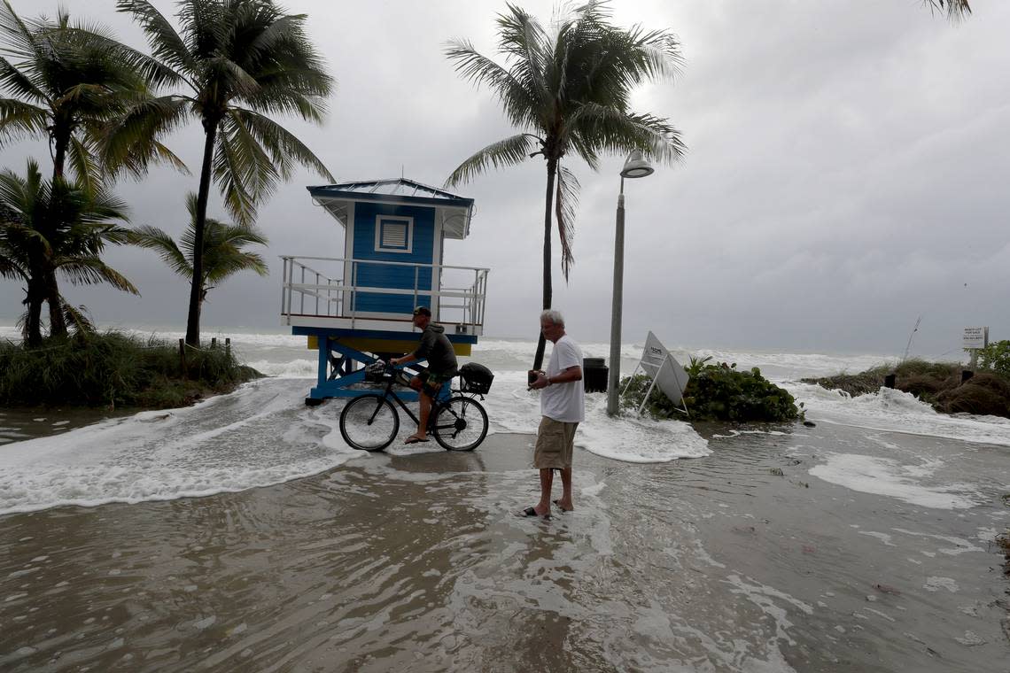 Waves wash ashore on Surf Road near Desoto Street as Tropical Storm Nicole continues to move towards the coast on Wednesday Nov. 9, 2022 in Hollywood Beach, Fla. (Mike Stocker/South Florida Sun-Sentinel via AP)