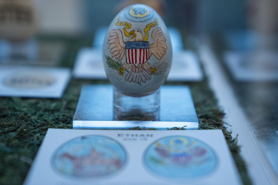 Eggs designed by children of members of the military adorn the East Colonnade of the White House ahead of the White House Easter Egg Roll, Thursday, March 28, 2024, in Washington. (AP Photo/Evan Vucci)