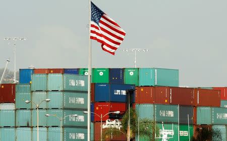 China Shipping containers lie on the dock after being imported to the U.S. in Los Angeles, California, October 7, 2010. REUTERS/Lucy Nicholson