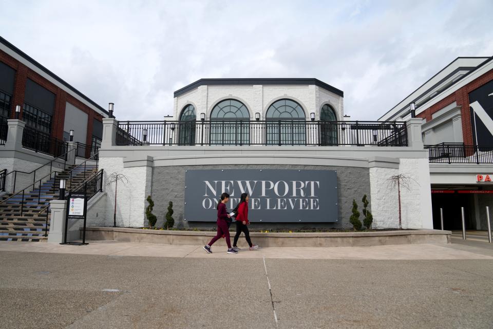 Patrons walk across the circle at Newport on the Levee, Wednesday, Feb. 22, 2023, in Newport, Ky. 