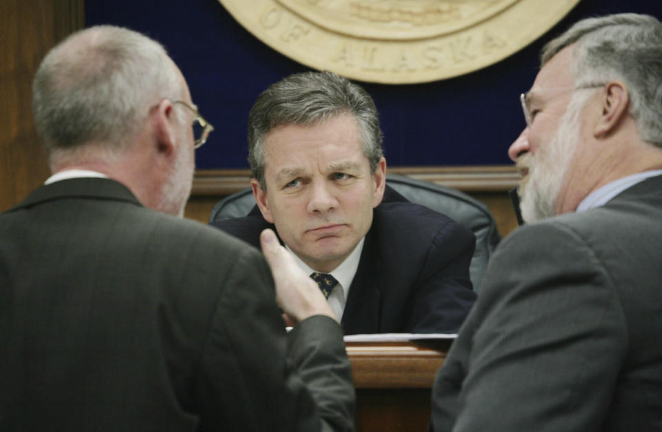 FILE - Then-Alaska State Senate President Ben Stevens, R-Anchorage, center, and Sen. Gary Stevens, R-Kodiak right, listen to Sen. Kim Elton, D-Juneau, May 3, 2006, during a Senate floor session at the Capitol in Juneau, Alaska. Ben Stevens, a former Alaska Senate president and a son of the late U.S. Sen. Ted Stevens, died on Thursday, Oct. 13, 2022. He was 63. (AP Photo/Seanna O'Sullivan, File)