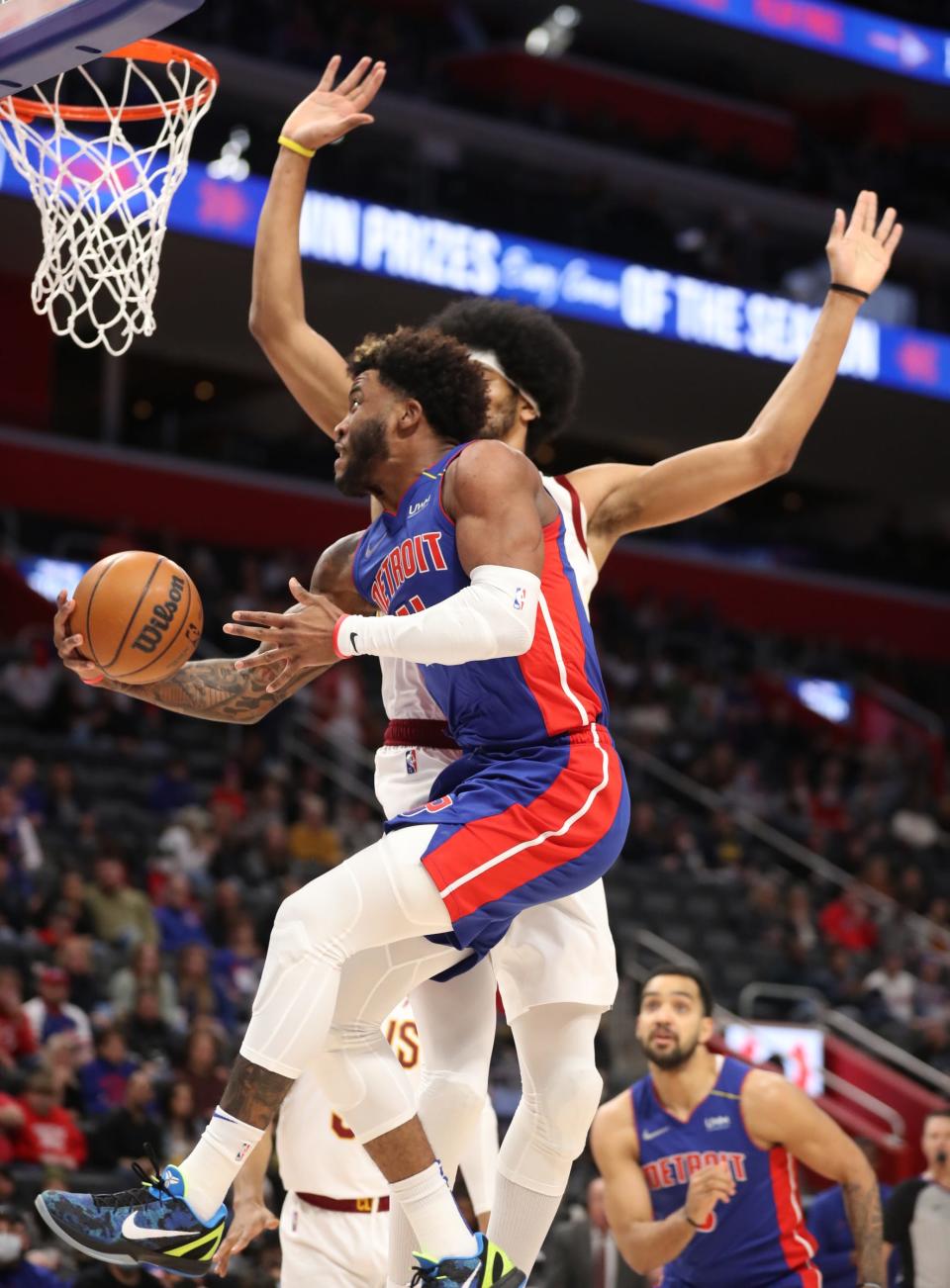 Detroit Pistons forward Saddiq Bey (41) drives against Cleveland Cavaliers center Jarrett Allen (31)  Sunday, Jan. 30, 2022 at Little Caesars Arena.