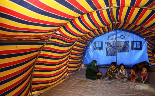 Nihaya Issa, 33, and her family live in Iraq's sprawling Khazer refugee camp