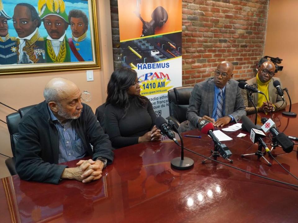 Several community group leaders united to criticize the premier of Quebec for his comments regarding random police stops on the road. From left to right, Frantz Voltaire, a Montreal filmmaker, Joan Lee the president of the West Island Black Community Association, Jean Ernest Pierre, the director of the CPAM radio station and Jean Fils-Aimé, an on-air personality with CPAM.  (Charles Contant/CBC - image credit)