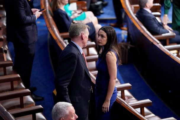 PHOTO: Rep. Paul Gosar (R-Ariz.) talks with Rep. Alexandria Ocasio-Cortez (D-N.Y.) on the opening day of the 118th Congress, Jan. 3, 2023, in Washington. (Jabin Botsford/The Washington Post via Getty Images)