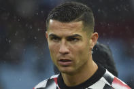 Manchester United's Cristiano Ronaldo stands on the pitch during warmup before the English Premier League soccer match between Aston Villa and Manchester United at Villa Park in Birmingham, England, Sunday, Nov. 6, 2022. (AP Photo/Rui Vieira)