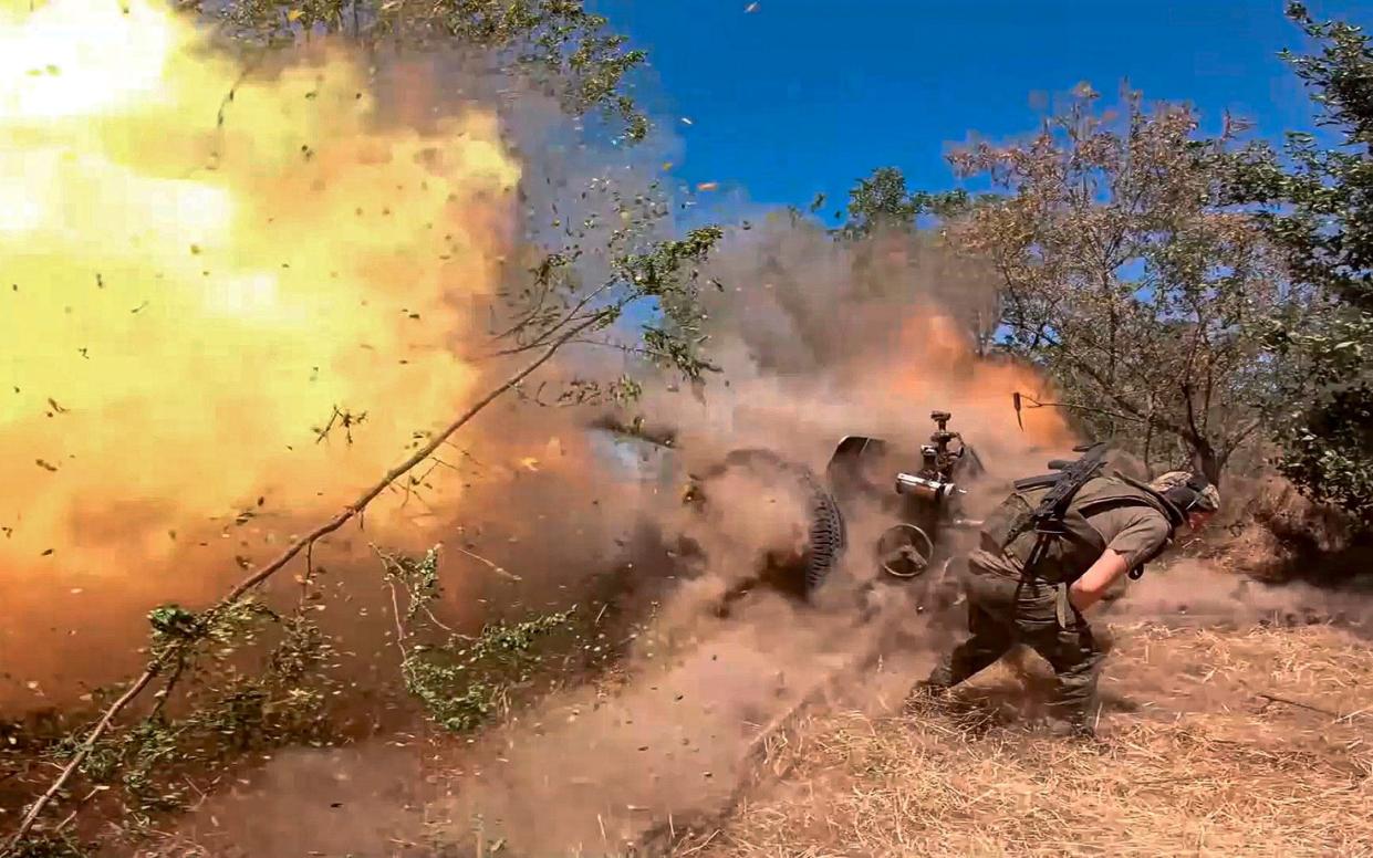 A Russian soldier fires from D-30 howitzer