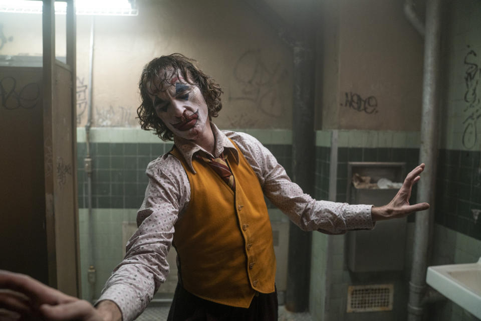 This image released by Warner Bros. Pictures shows Joaquin Phoenix in a scene from "Joker." On Monday, Jan. 13, the film was nominated for an Oscar for best picture. (Niko Tavernise/Warner Bros. Pictures via AP)