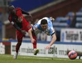 Swansea City's Modou Barrow (L) challenges Blackburn Rovers' Craig Conway during their FA Cup fourth round soccer match at Ewood Park in Blackburn, northern England January 24, 2015. REUTERS/Andrew Yates (BRITAIN - Tags: SPORT SOCCER)