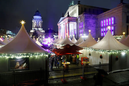 People visit the Christmas Market on Gendarmenmarkt in Berlin, Germany November 27, 2017. REUTERS/Axel Schmidt