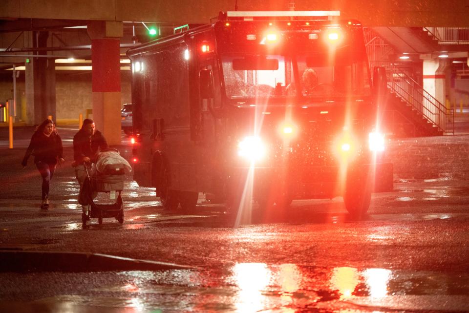 Law enforcement officers respond to the scene of a shooting at American Dream in East Rutherford, N.J., on April 7.