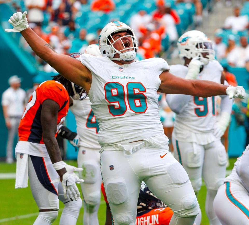Miami Dolphins defensive tackle Brandon Pili (96) reacts after a play against the Denver Broncos during fourth quarter of an NFL football game at Hard Rock Stadium on Sunday, Sept. 24, 2023 in Miami Gardens, Fl.