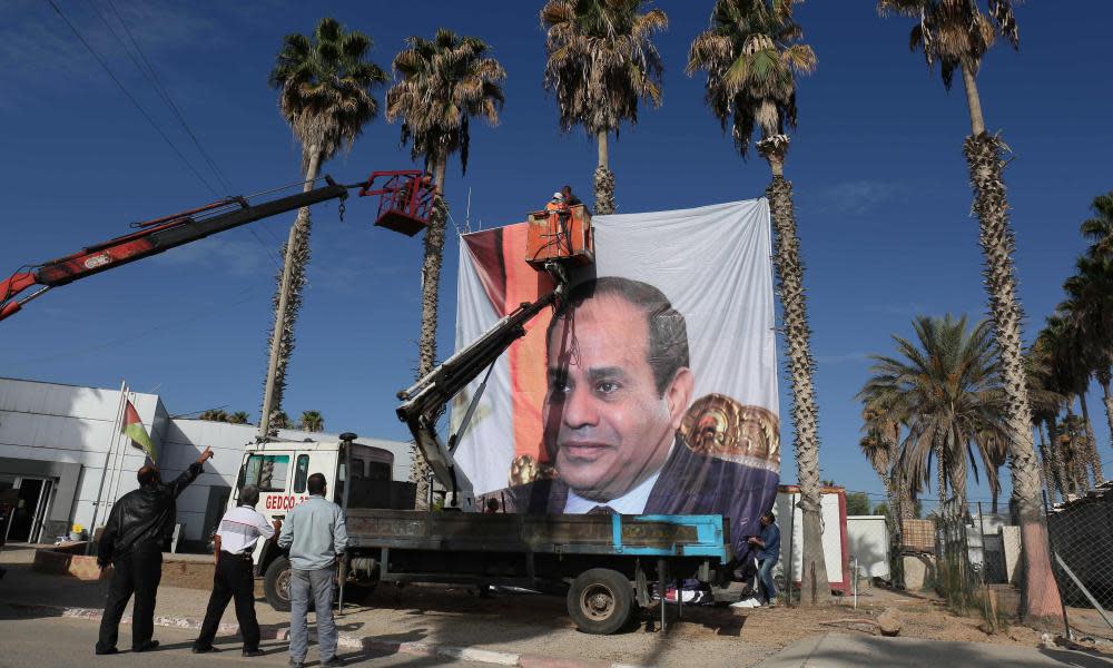 A portrait of Egyptian president Abdel Fattah al-Sisi is erected at the Rafah border crossing with Egypt.