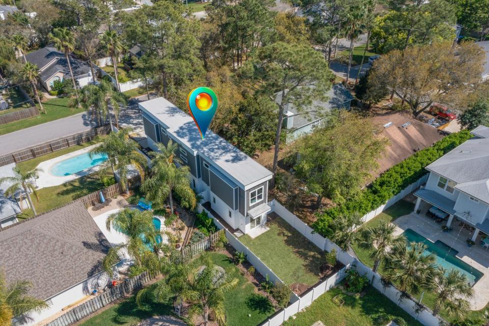 An aerial view of a skinny house in Florida.