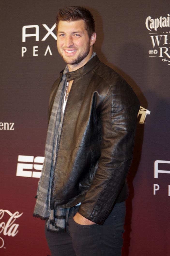 Time Tebow attends at ESPN The Party, on Friday, Jan., 31, 2014 in New York. (Photo by Scott Roth/Invision/AP)