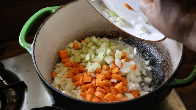 pot of onion, garlic, celery, and carrots