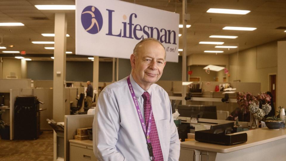 Gabriel Geiger, Coordinator of Engagement & Outreach/Financial Services at Lifespan inside the Brighton offices.