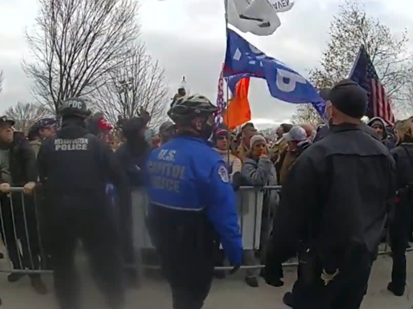 New video footage released by the Justice Department has revealed parts of the alleged attack on Capitol police officer Brian Sicknick during the 6 January insurrection (Department of Justice)