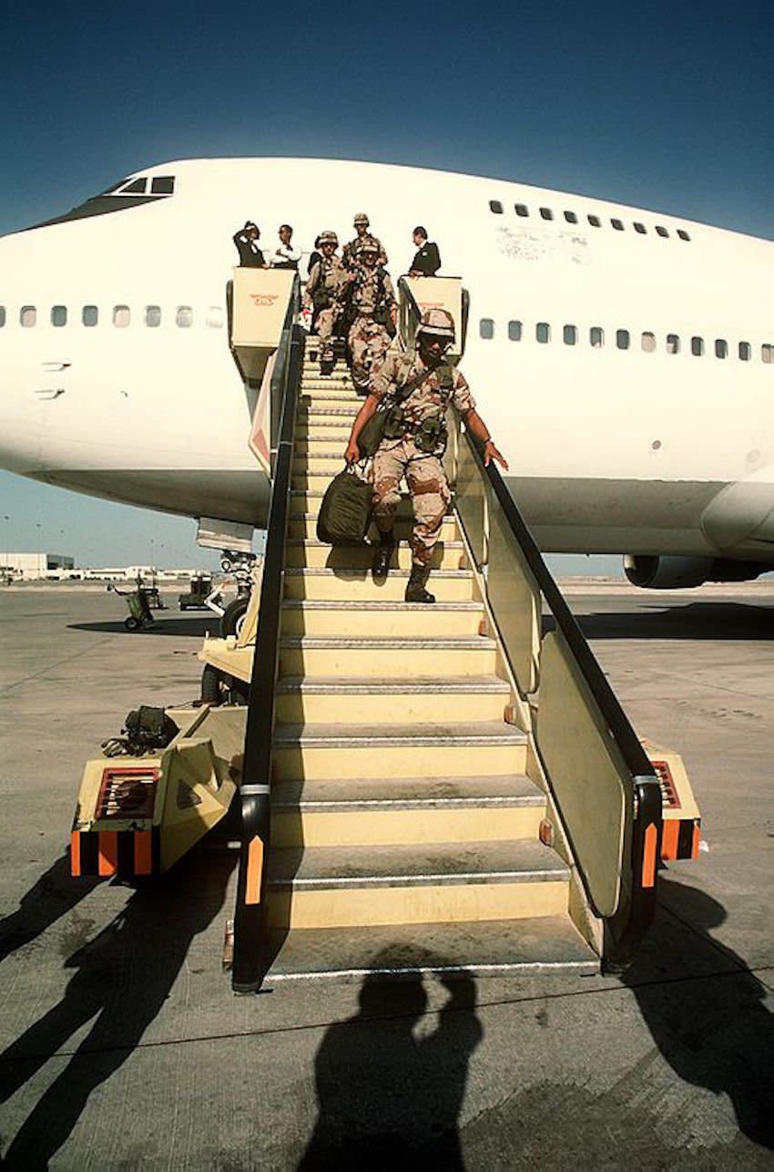 civilian Boeing 747 offloading troops in Saudi Arabia during Operation Desert Shield