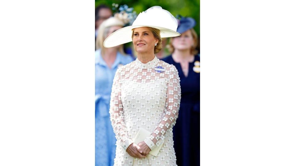 Sophie in white dress and hat