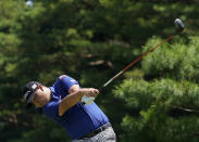 Korea's Si Woo Kim plays a tee shot from the 12th hole during a practice round of the men's golf event at the 2020 Summer Olympics, Tuesday, July 27, 2021, at the Kasumigaseki Country Club in Kawagoe, Japan, (AP Photo/Matt York)