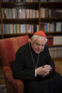German Cardinal Gerhard Mueller speaks during an interview with The Associated Press in his apartment in Rome, Wednesday, Jan. 4, 2023. Benedict gave his fellow German theologian his old job, as prefect of the Vatican’s doctrine office. He entrusted his life’s theological works to Mueller, who has spent nearly two decades organizing them in a 16-volume, 25,000-page opus along the lines of Thomas Aquinas’ Summa Theologica. He gave him his old flat on the top floor of a Vatican apartment building, where he had lived as Cardinal Joseph Ratzinger. (AP Photo/Domenico Stinellis)