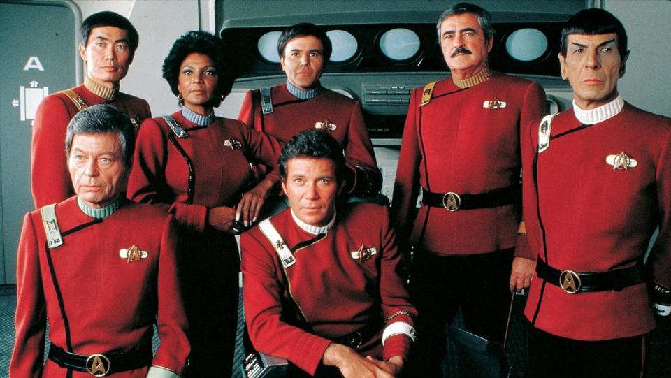 The cast of the Star Trek flms, wearing their parts II-VII uniforms.