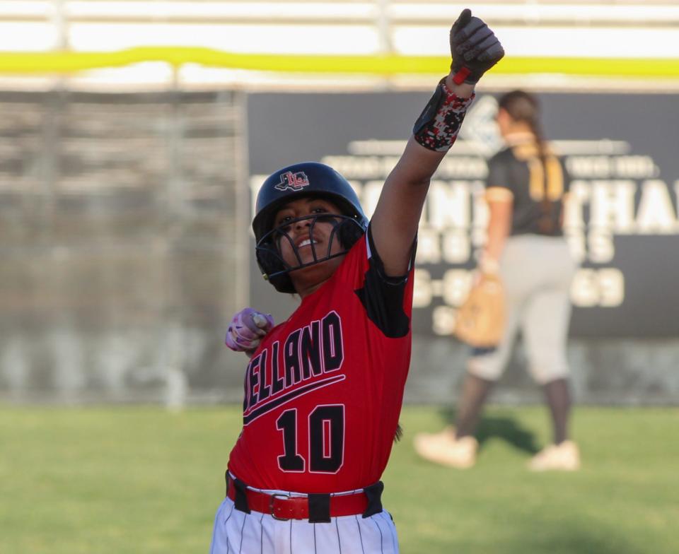 Levelland's Chloe Constantino gestures to the dugout after a double in a District 5-4A softball game on Friday, April 21, 2023 at Levelland High School.