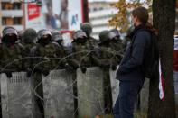 Belarusian opposition supporters hold a rally in Minsk