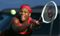Serena Williams returns a shot to Ashley Harkleroad during their match at the JPMorgan Chase Open tennis tournament Wednesday, Aug. 9, 2006, in Carson, Calif. Williams won the match 6-3, 6-2. (AP Photo/Mark J. Terrill)