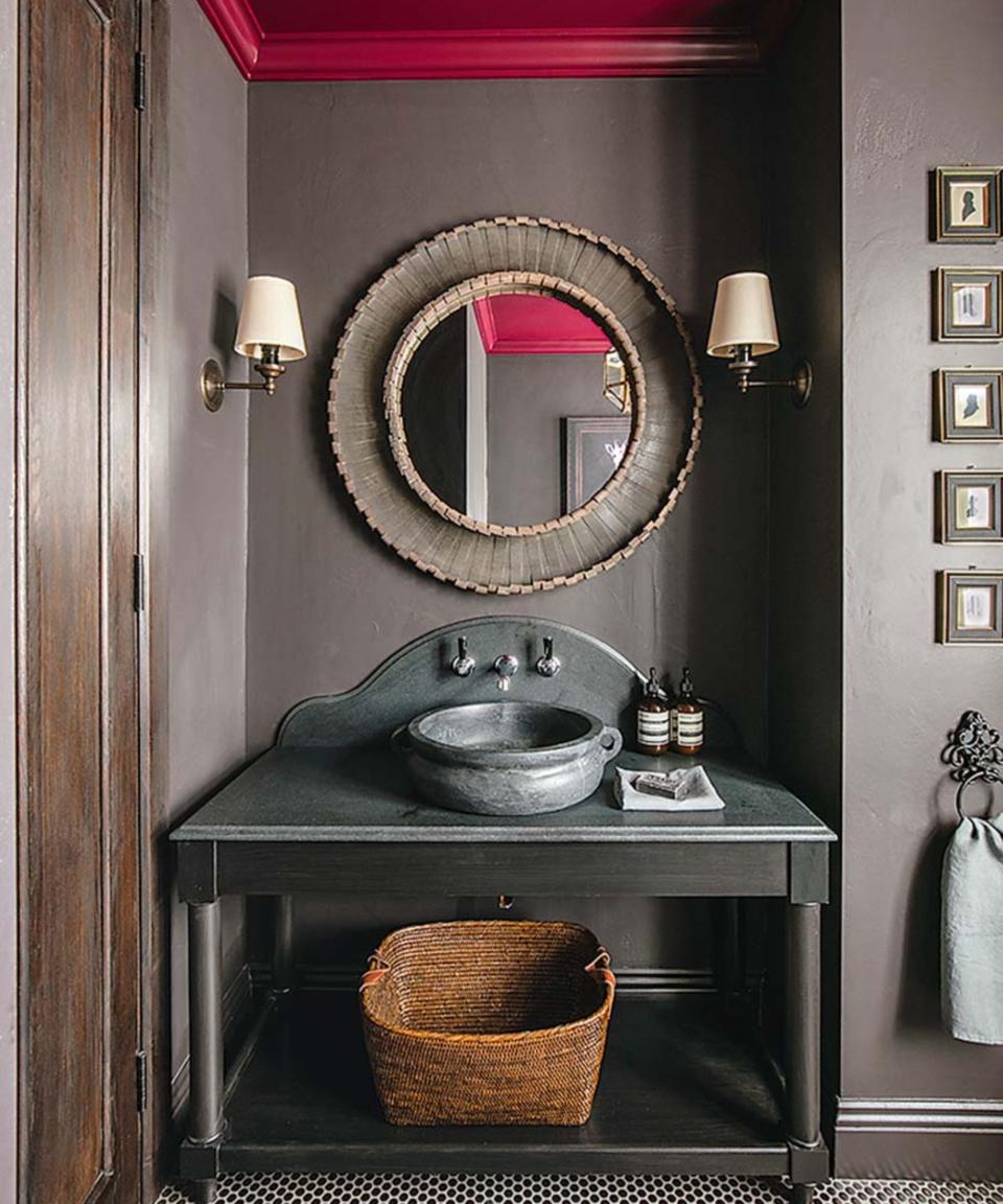 Red ceiling, grey counter and sink, brown walls