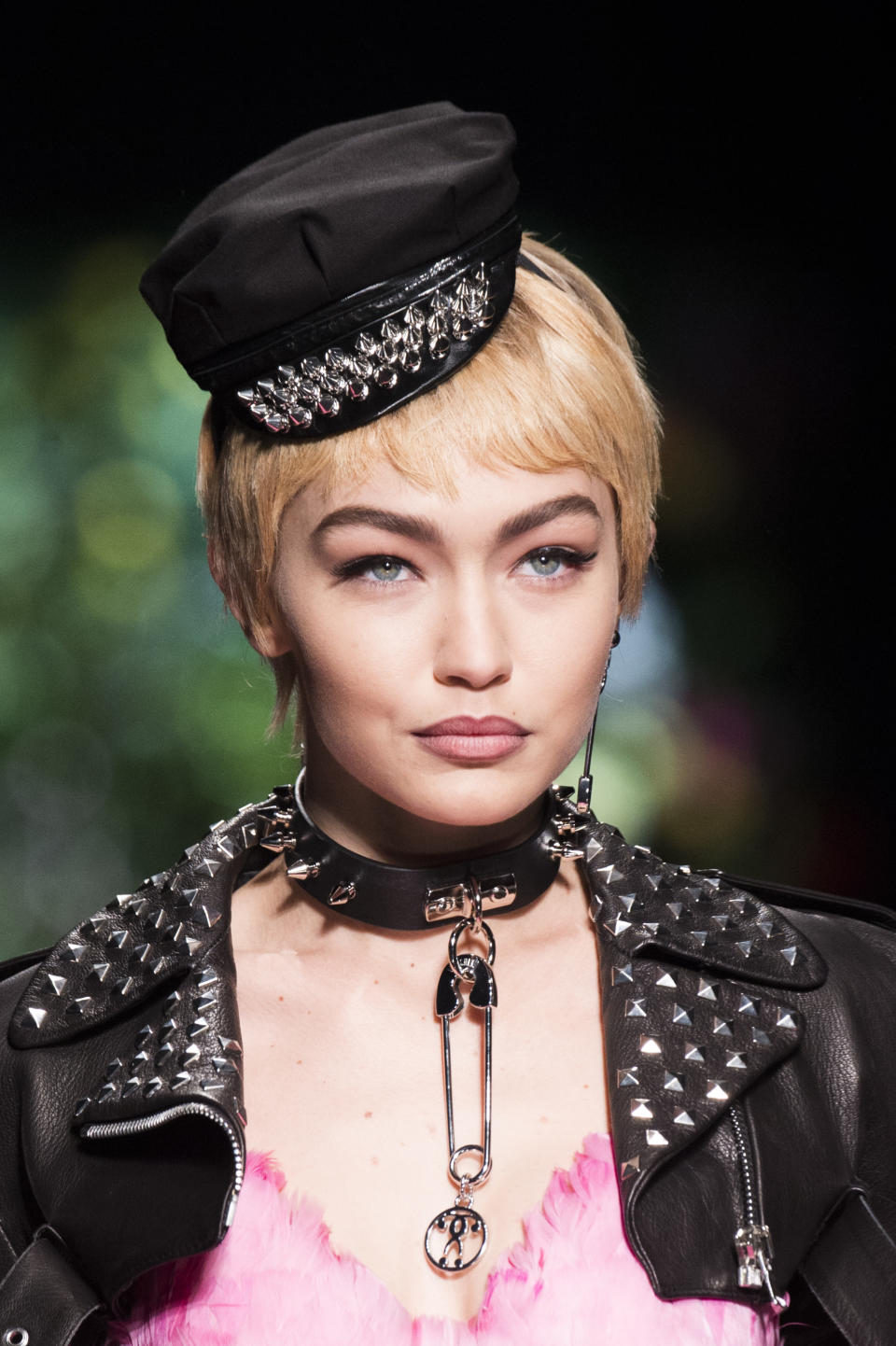 <p><i>Gigi Hadid wears a tiny cap from the SS18 Moschino collection. (Photo: ImaxTree) </i></p>