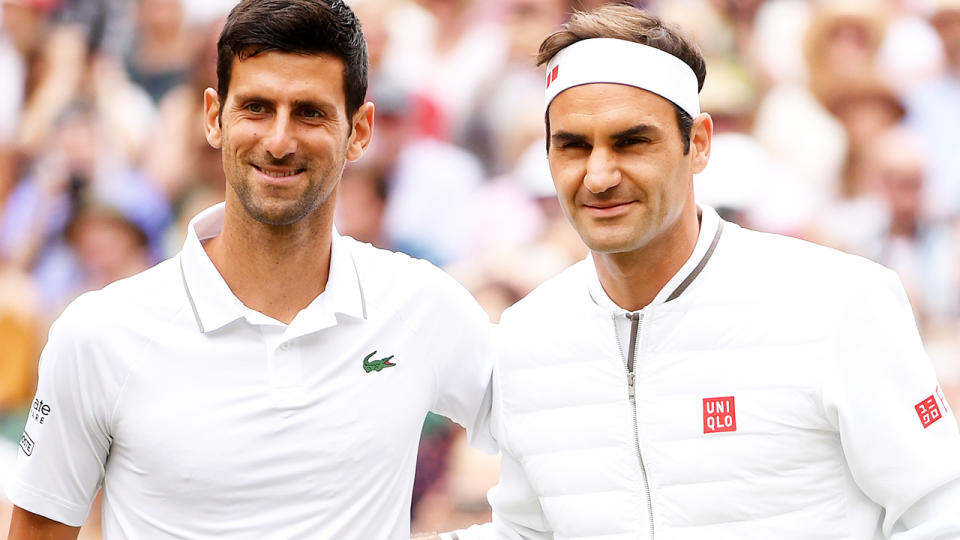 Novak Djokovic and Roger Federer, pictured here at Wimbledon in 2019.