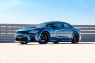 <p>If you need more practicality than a Challenger can offer, step up to a Charger. You can't have it with a stick, but you are getting one of the fastest sedans in the world, with a top speed of 196 mph. It's a lot cheaper than any European super-sedan, too. </p>