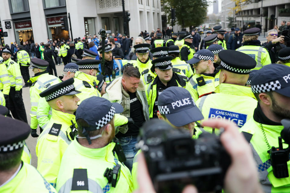 LONDON, ENGLAND - NOVEMBER 26: British far-right activist, Tommy Robinson is detained by police during the march against anti-Semitism on November 26, 2023 in London, England. The ongoing war between Israel and Hamas has sparked a wave of protests across Europe, and heightened concerns over anti-Semitism among Jewish communities. (Photo by Alishia Abodunde/Getty Images)