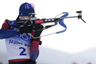 Johannes Thingnes Boe of Norway shoots during the men's 15-kilometer mass start biathlon at the 2022 Winter Olympics, Friday, Feb. 18, 2022, in Zhangjiakou, China. (AP Photo/Kirsty Wigglesworth)