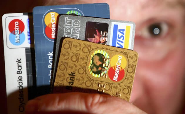 Fewer people in Singapore took up credit cards in 2013 than they did in 2012. (Getty Images)