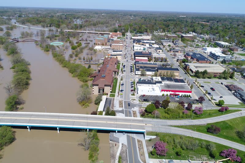 Rising flood waters of the Tittabawassee River advance upon the city after the breach of two dams in Midland