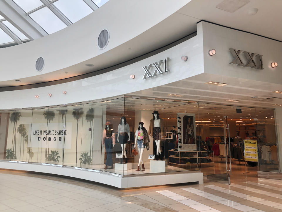 A Forever 21 store is shown, Monday, Sept. 30, 2019, in Aventura, Fla. The low-price fashion chain, a one-time hot destination for teen shoppers that fell victim to its own rapid expansion and changing consumer tastes, has filed for Chapter 11 bankruptcy protection. (AP Photo/Wilfredo Lee)