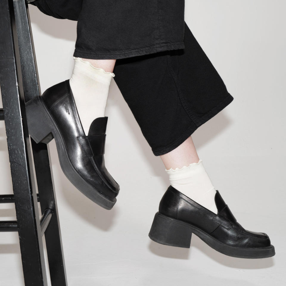 Footwear News Shop editor Claire Sullivan wears frilly white Bombas ankle socks with loafers