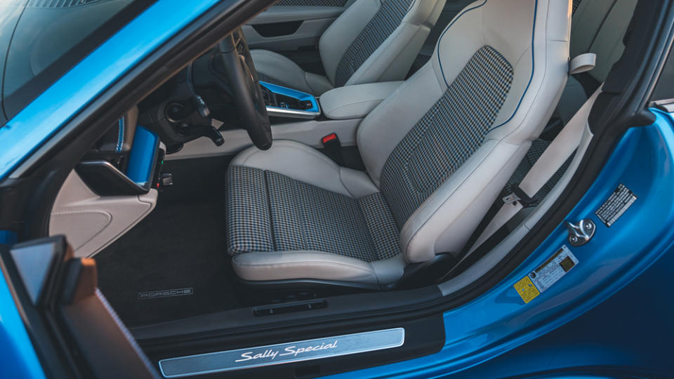 The seats are fully customized with Pepita-patterned upholstery done in Speed Blue, Chalk and black. - Credit: Porsche Cars North America