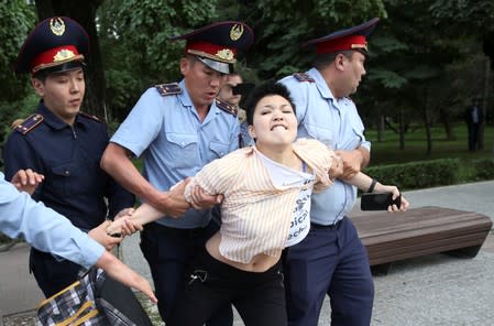 Kazakh opposition supporters hold a rally in Almaty