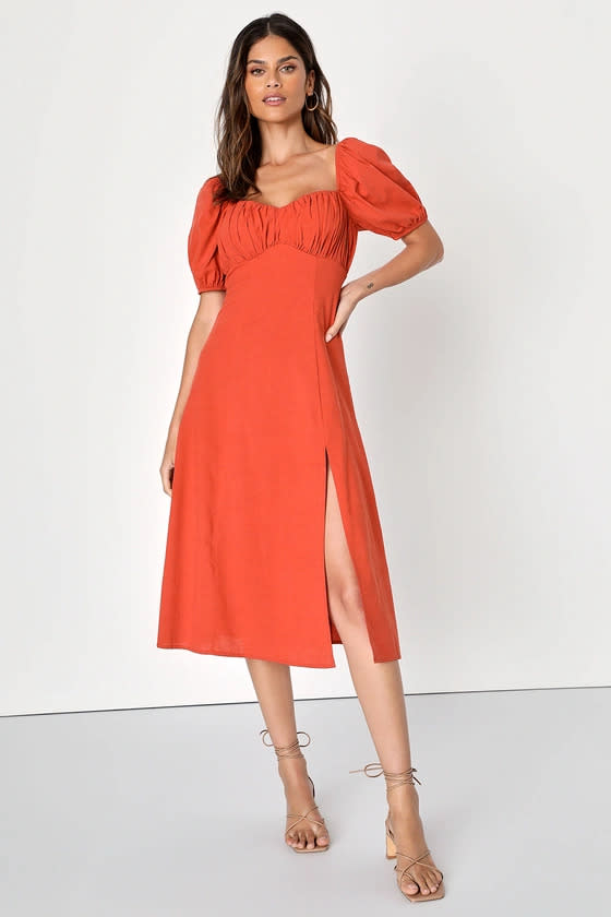 Model wears Lulus Endearing Darling Rust Orange Linen Puff Sleeve Midi Dress