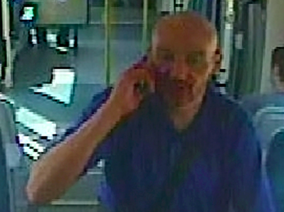 Police have released CCTV pictures in the hunt for a drunk man who attacked a pregnant woman on a tram. (SWNS)